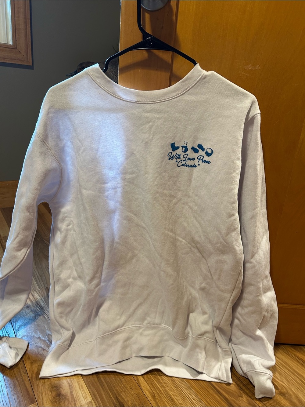 Women's White Crewneck Sweatshirt with Teal Chest Logo